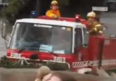 Fire Truck coming out of an extremely deep water fording run