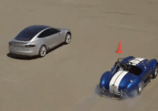 Jay Leno in Cobra racing a Tesla